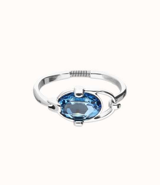 Pulsera rígida bañada en plata de ley con cristal facetado azul